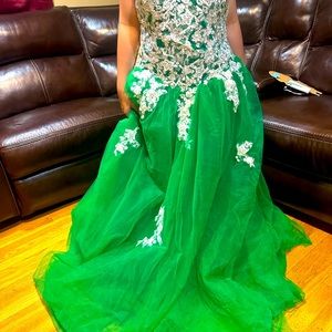 Big green gown ( if interested and you want more pictures I am happy to do so)